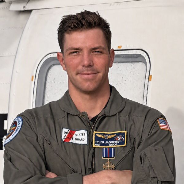 Man in a Coast Guard uniform with medals.