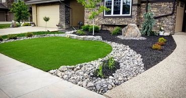 Low maintenance front yard with shrubs trees and beautiful front yard ambience