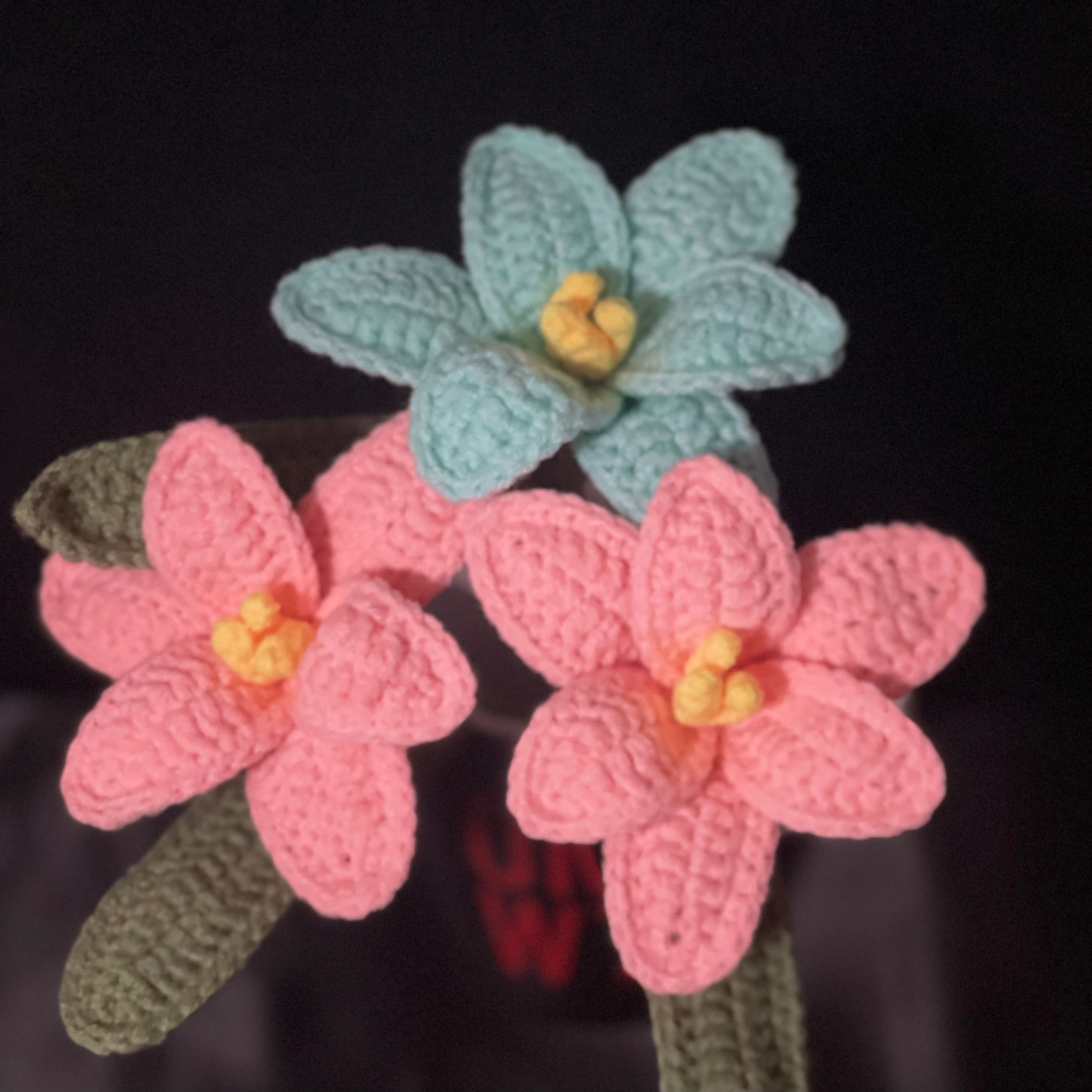 Crochet tulips in baby blue and baby pink in the Krochet ByKays collection