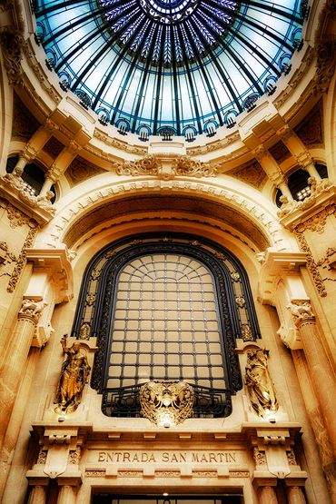 Skylight and archway of a shopping gallery done in the Art Nouveau style.