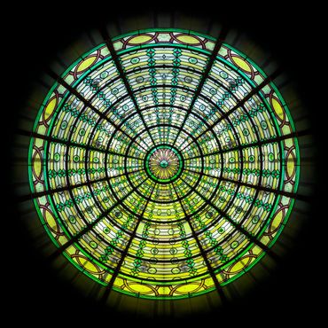 Different shades of green create this radial design which is source from stained glass.