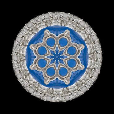 Blue and white mandala featuring the columns and the face from the Greek Theatre at the Guild