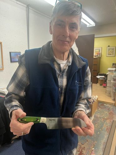 Allan Holding His Kolt