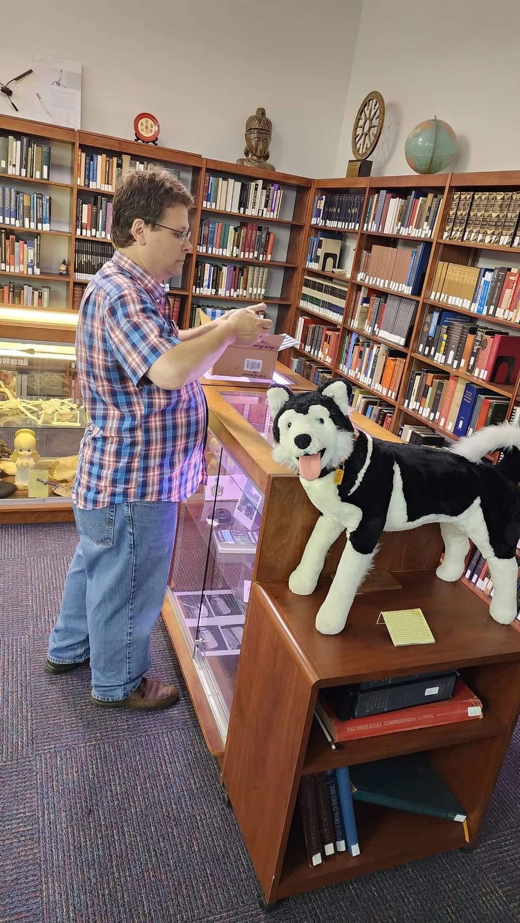 Me, taking a picture of the items.  Photo by Kenny Biddle.