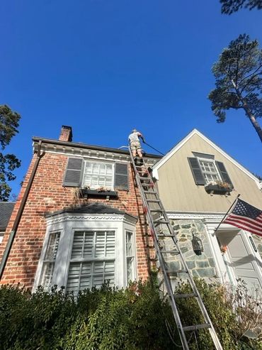 Cleaning a valley on a slate roof and gutter cleaning in Tuckahoe, Va.