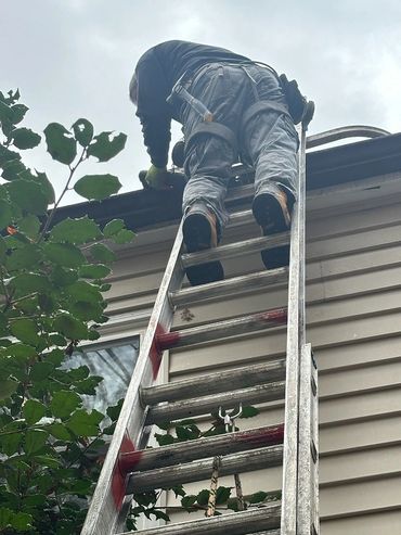 Repairing gutters in Glen Allen, Va.