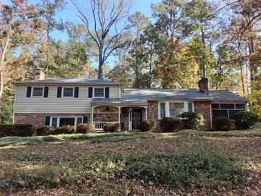 Gutter cleaning at Cotlett house located in Tuckahoe, Va.