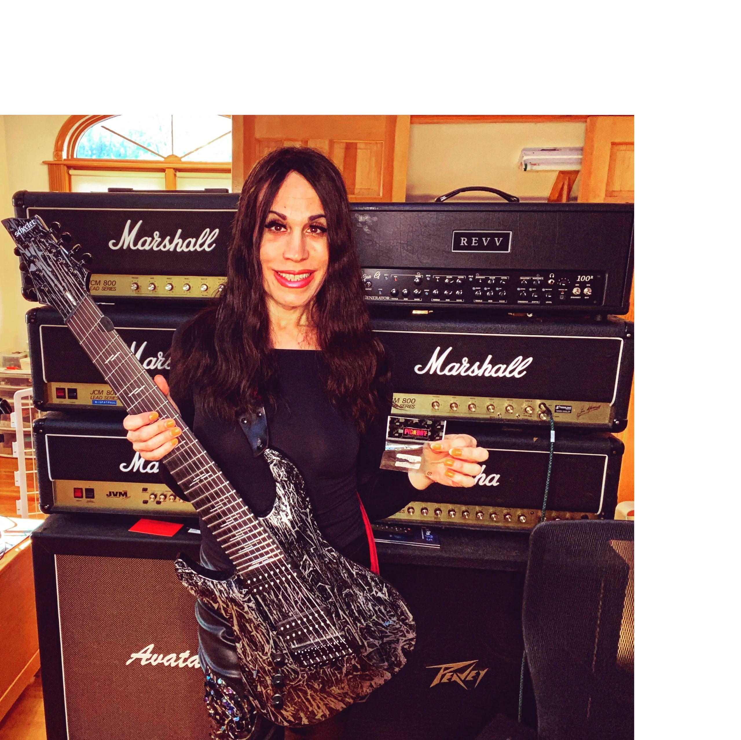 Me with 8 String Schecter Guitar , Pick boy Guitar Picks ,  SIT Strings . 5 Marshall Amps , Revv Amp