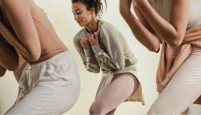 Women practising fertility-focused movement for PCOS in a The Fertility Class session