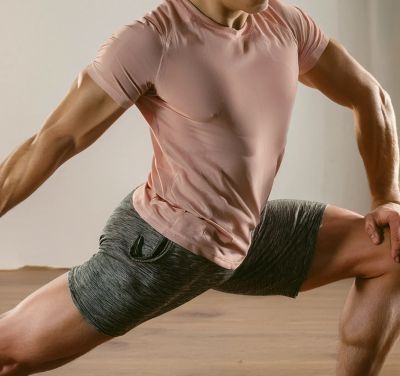 Man in a deep side lunge stretch