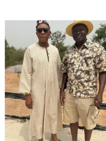 Fr. Beyuo meeting with the village chief to begin the project.