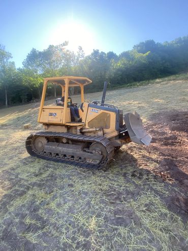 Bulldozing a house site