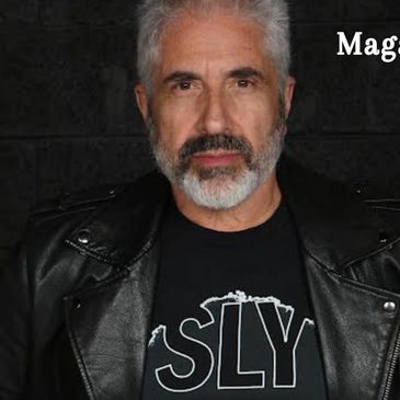 Man in leather jacket and SLY t-shirt on a magazine cover.