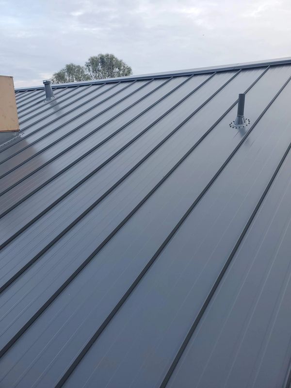 ASC Skyline metal roof in Old Town Gray. Beautifully matching cone pipe flashing in Manteca, CA