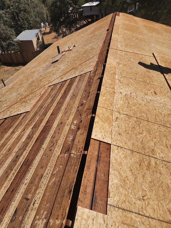 Plywood installation & cutting the ridge for proper attic ventilation in
Mi-Wuk Village, CA.