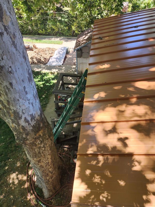 Copper Penny ASC Skyline metal roofing installed by the experts at Precision Line Roofing & Gutters.