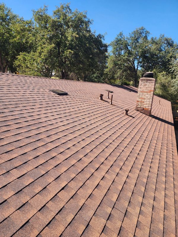 Hickory GAF Timberline HDZ RS shingle roof installation in Escalon, CA.