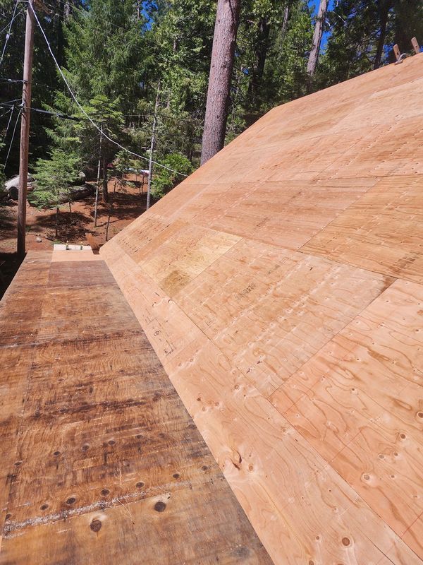 1/2" CDX decking over skip sheathing for 16" Skyline metal roof in Modesto, CA.