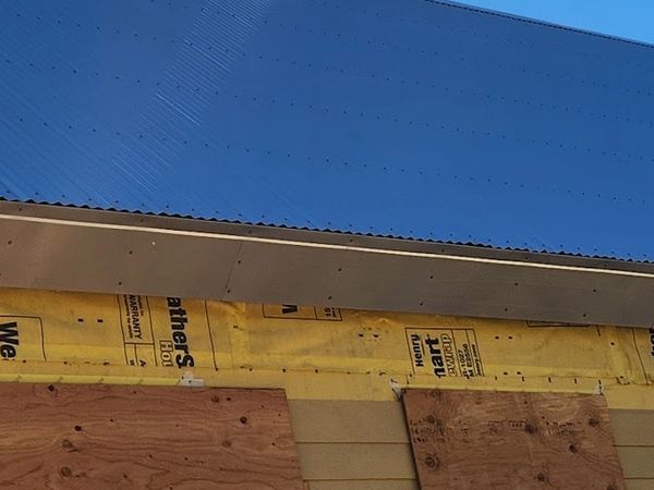 Zincalume Plus corrugated metal roof. We custom-make and install metal covers for your fascia.