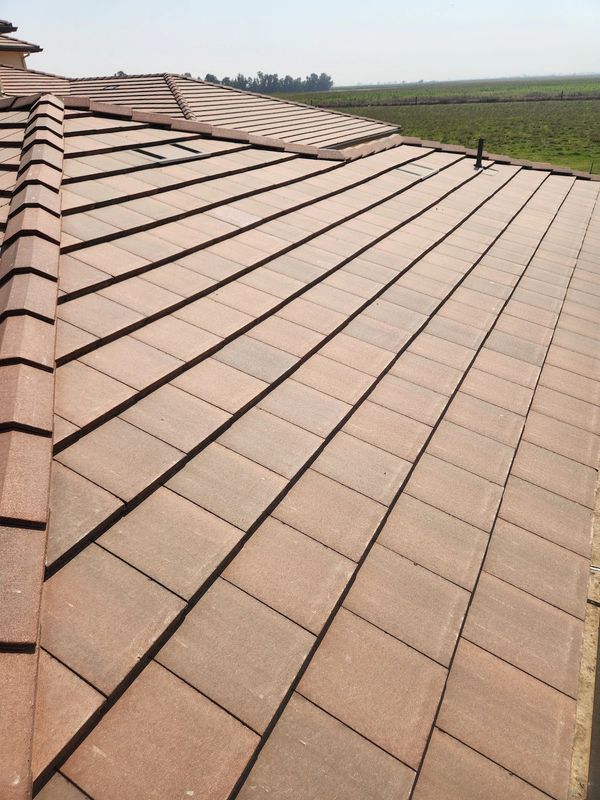 Premium Eagle concrete tile installation in Waterford, CA. Upgrading homes with durable materials.