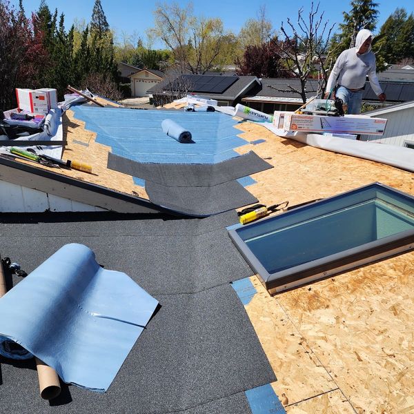 Custom cricket with Flintlastic SA & new skylight installation in Sonora, CA.