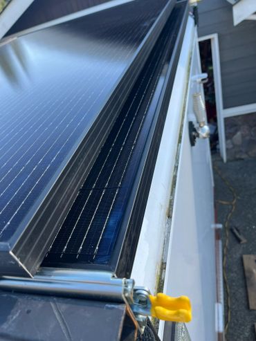 Custom solar panel installation with slide out solar panels