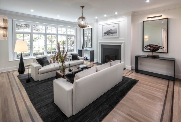Westport CT formal living room, white sofas facing each other, black and white coastal photography