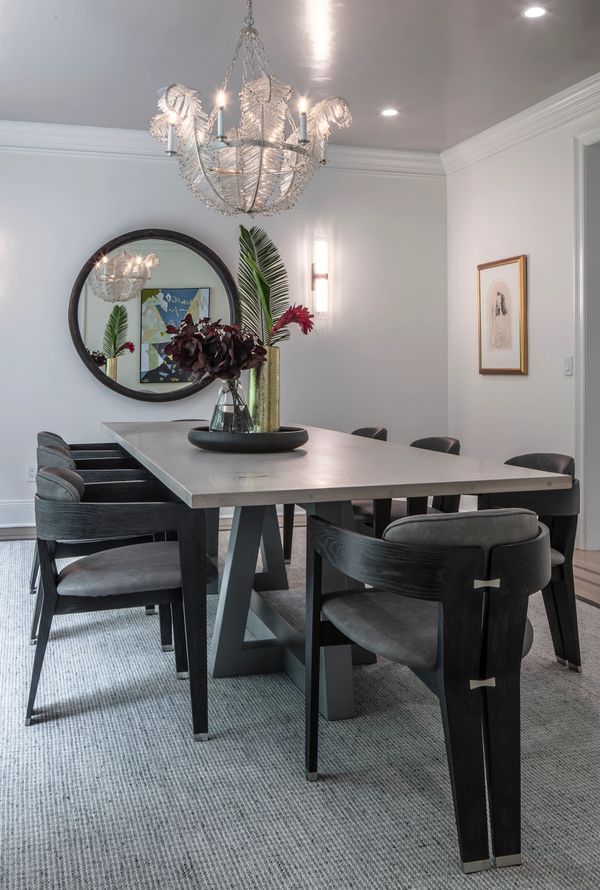 Westport CT dining room, black dining chairs, large mirror, contemporary fine art