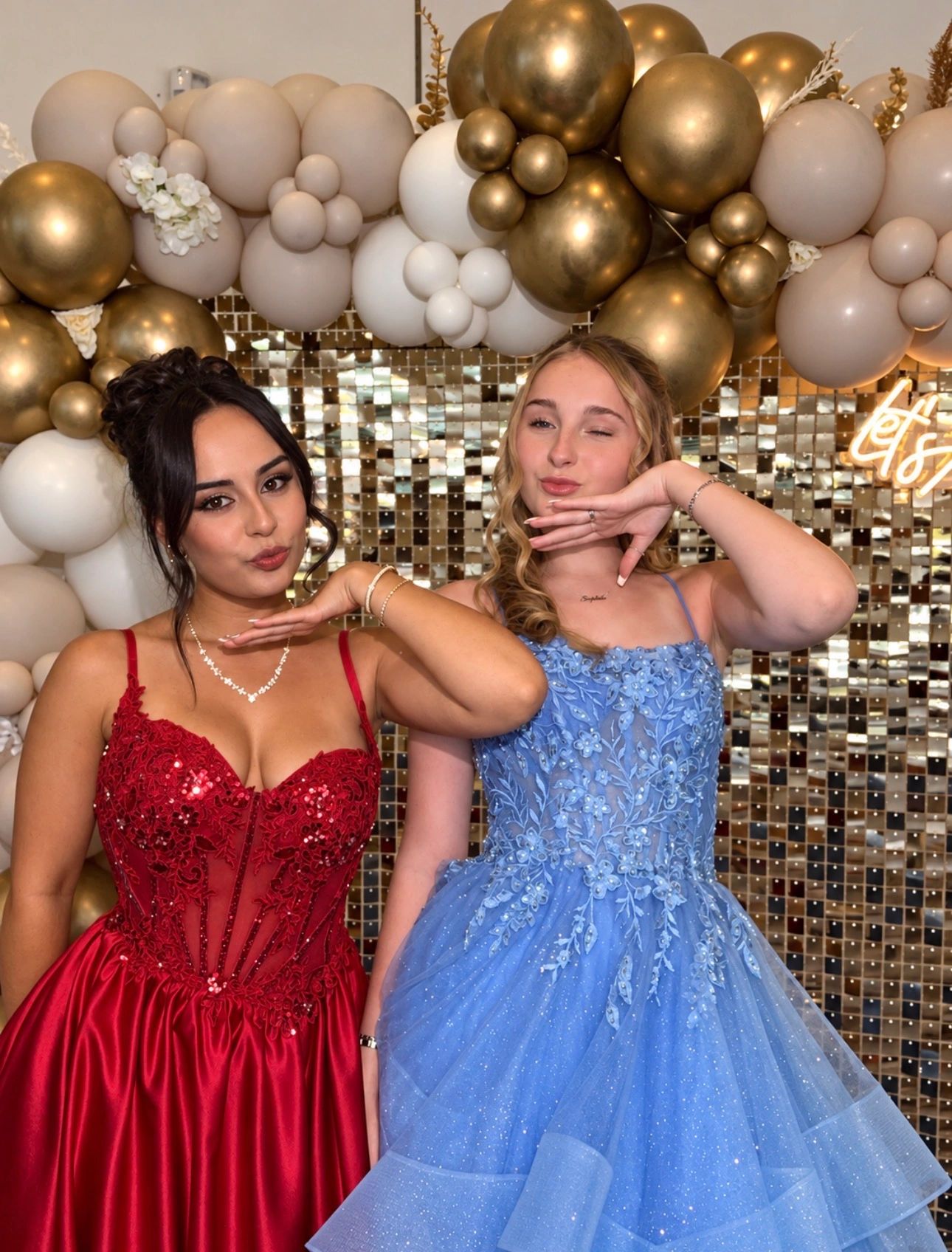 Prom night, 2 guests taking picture with our selfie booth