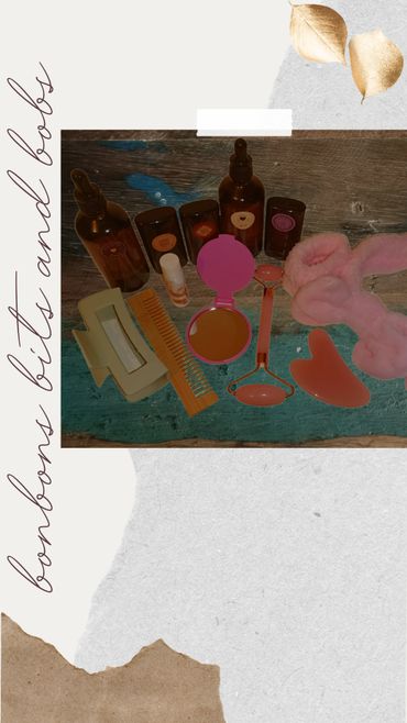 A collection of beauty and self-care tools on a wooden surface with decorative text.