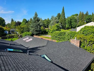 Shingle roof replacement project in Clyde Hill, WA by Archetype Roofing