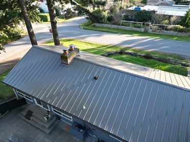 Metal Roof replacement project in Lake Forest Park, WA by Archetype Roofing