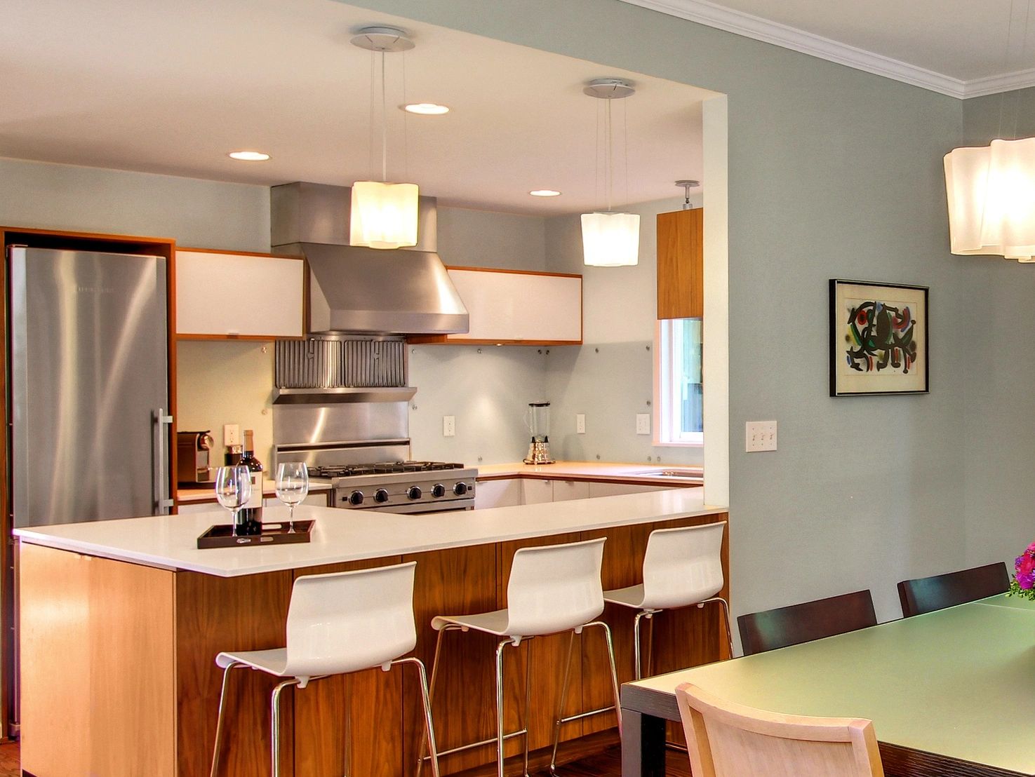 Walnut and white modern kitchen and dining room