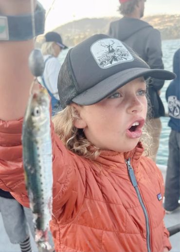 Dana Point Surf Club family fun day on a fishing boat.