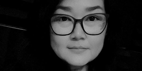 Black and white portrait of Lury Amagawa.