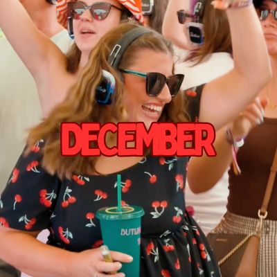 People enjoying a party with headphones and sunglasses.