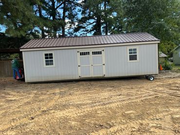moving portable shed in the yard