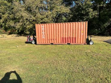 shipping container being moved