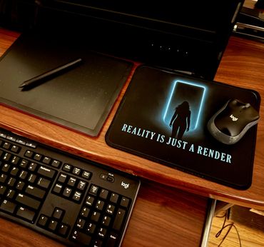 A computer setup with a keyboard, drawing tablet, and mouse on a desk.