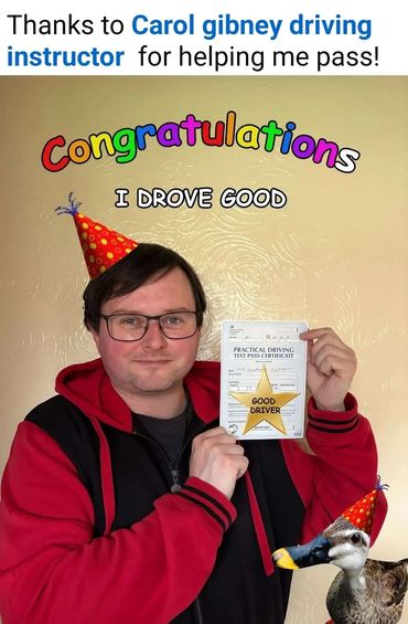 Man and duck wearing party hats celebrating driving test success.