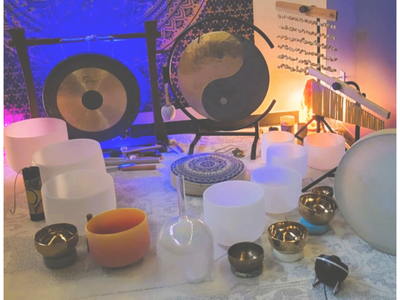 Special instruments tuned to certain frequencies are used during a sound bath for deep relaxation.
