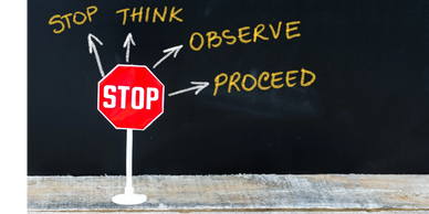 Stop sign with advice to stop, think, observe, and proceed.