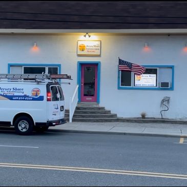 Picture of office with van out front 