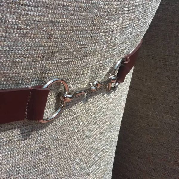 Custom upholstered chairs featuring bit and bridle