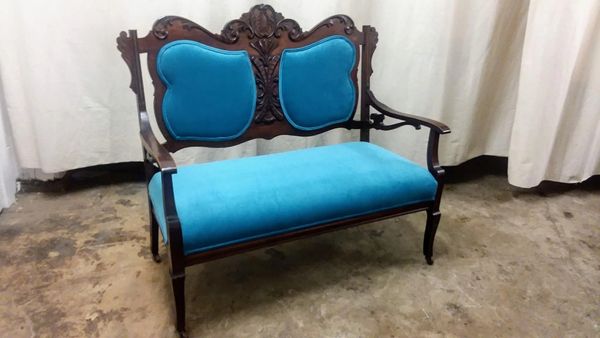 Custom upholstery: antique settee in blue velvet 