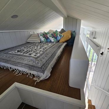 The reading loft inside the Tiny House