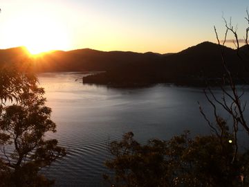 Sunset over hawkesbury river adventure present ideas things to do sydney boat holiday kayak tour