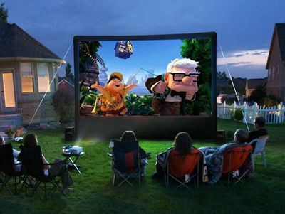 Enjoying an outdor inflatable movie screen in your backyard/home.