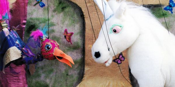 Unicorn and bird marionette puppet from In Search Of The Unicorn by Rosalita’s Puppets 
