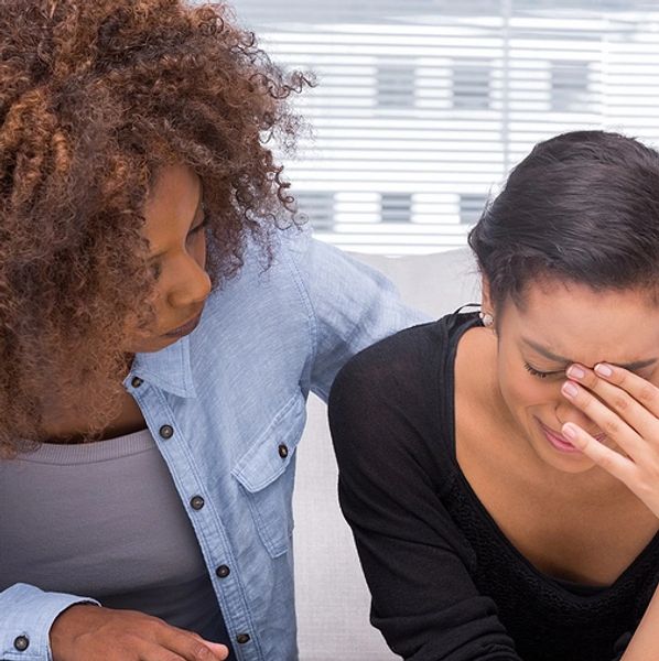 distressed woman with a friend
